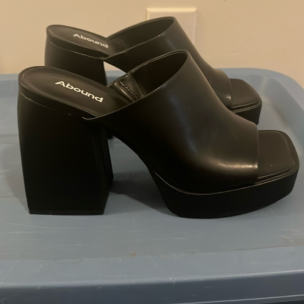 Black size 10 platform heels purchased from Nordstrom Rack. Never been worn